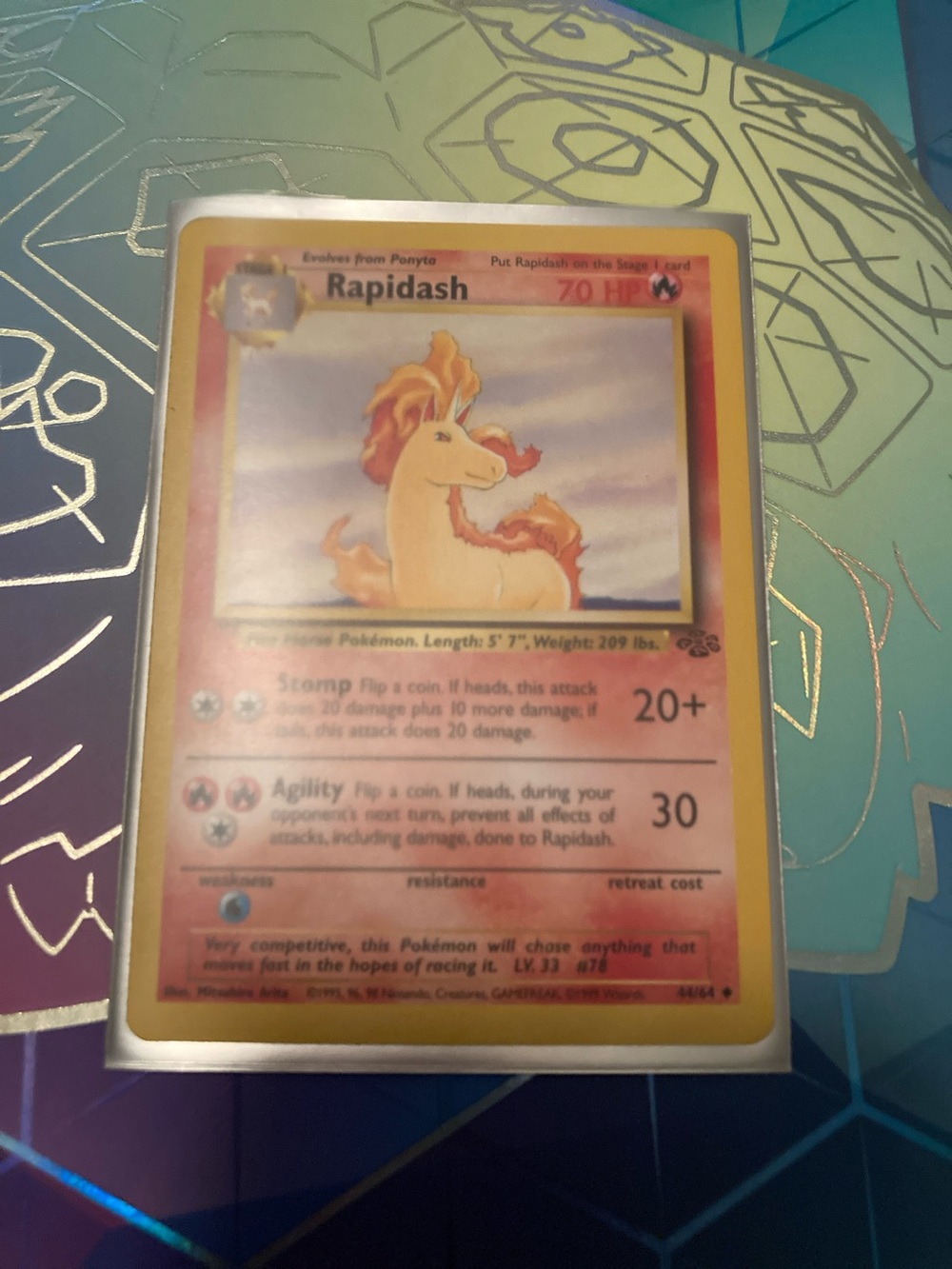 Pokemon Rapidash Trading Card - Orange and Yellow Artwork